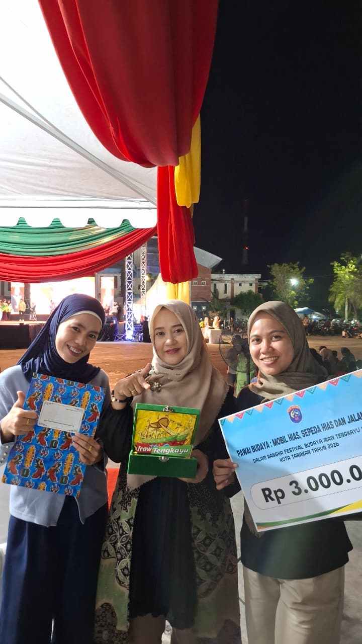 Juara 3 Pawai Budaya Mobil Hias Iraw Tengkayu